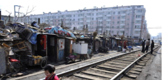 Chinese Citizens’ Household Wealth Squeezed by Booming Debt, Wage Disparity, Economist Says